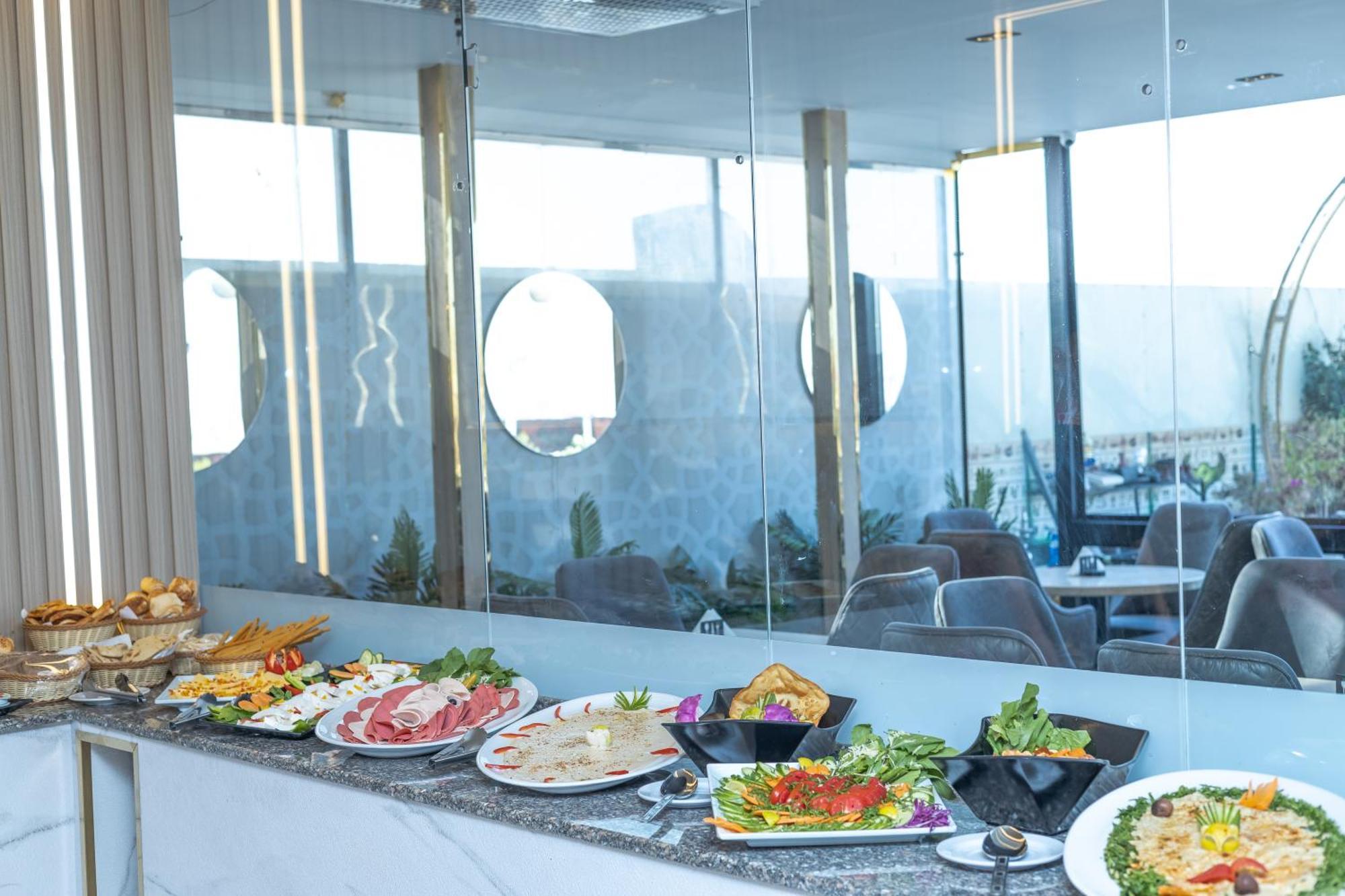 Al Kawm al Akhdar Comfort Giza Inn View מראה חיצוני תמונה
